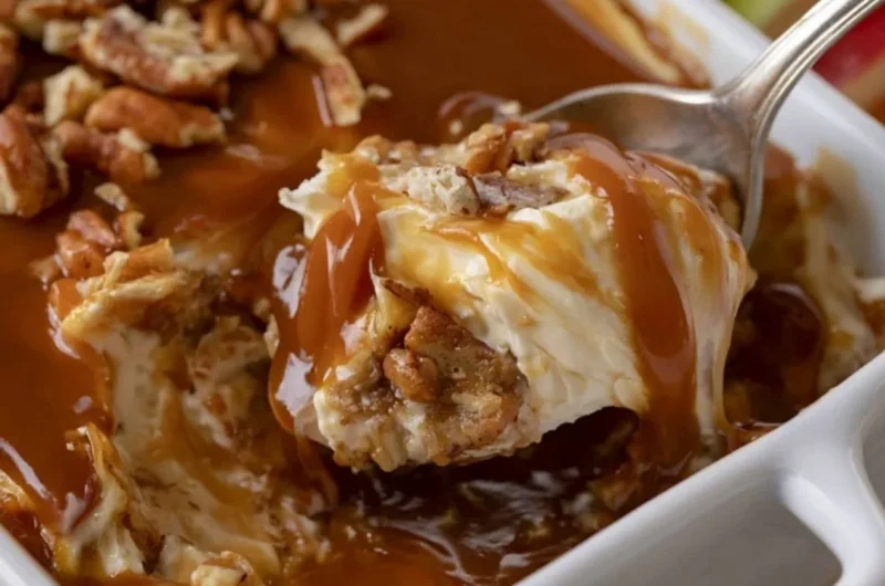 Caramel Apple Cheesecake Dip served with apple slices and caramel drizzle