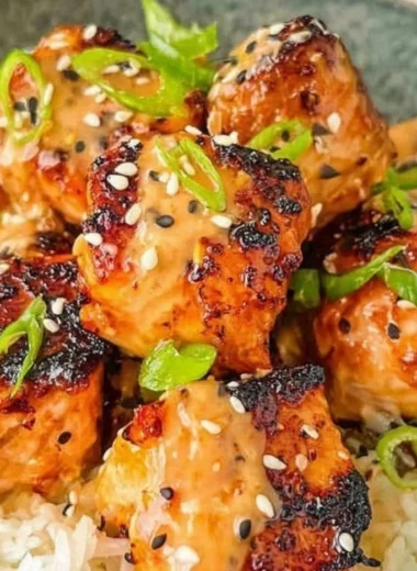 Delicious Bang Bang Salmon dish served with rice and vegetables