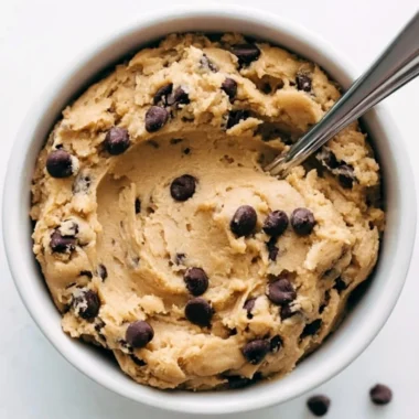 Cozy edible cookie dough in a bowl with chocolate chips