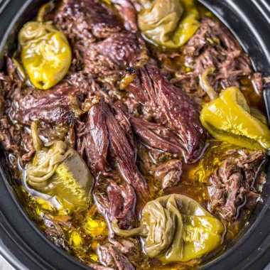 Delicious Crockpot Mississippi Pot Roast with tender beef and savory seasonings