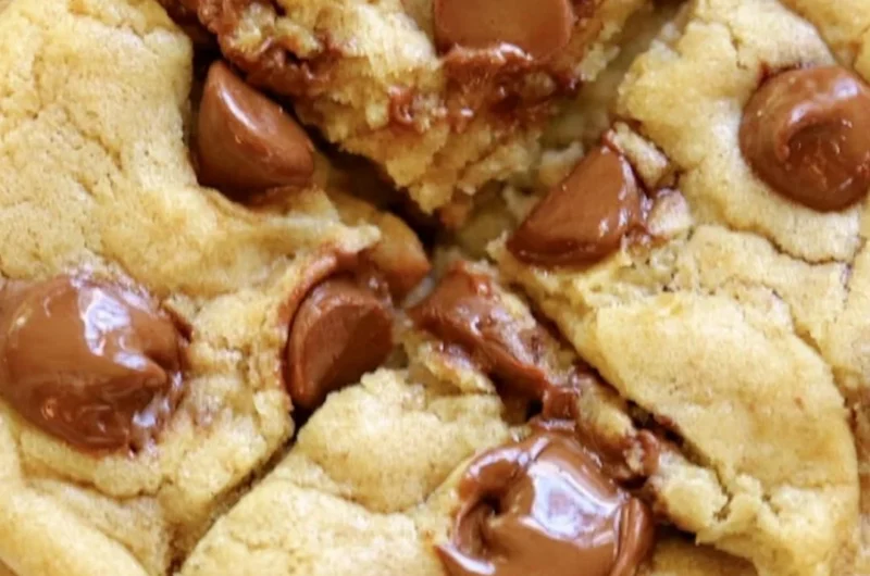 Freshly baked Crumbl chocolate chip cookies with gooey chocolate chunks
