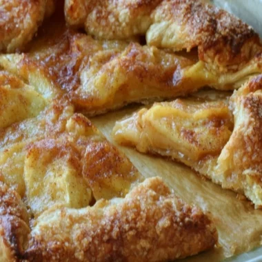 Homemade rustic French apple tart with fresh apples and flaky crust