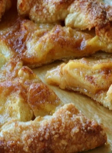 Homemade rustic French apple tart with fresh apples and flaky crust