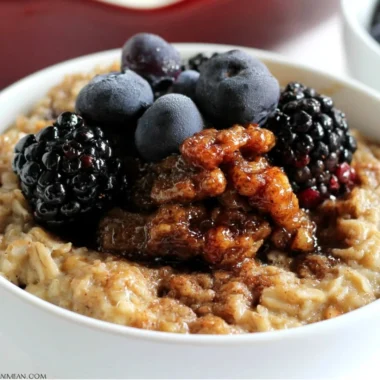 Maple and Brown Sugar Baked Oatmeal in a bowl topped with fruits