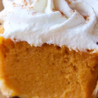 Delicious pumpkin pie cupcakes topped with creamy frosting and spices.