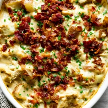 Savory creamy chicken potato casserole in a baking dish ready to serve.