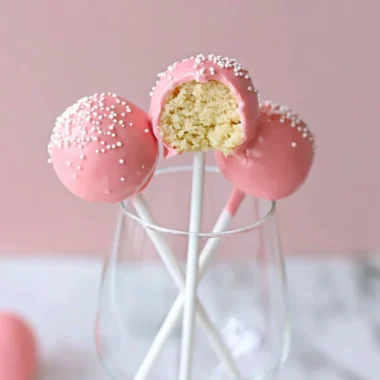 Delicious Starbucks cake pops showcased on a vibrant display.