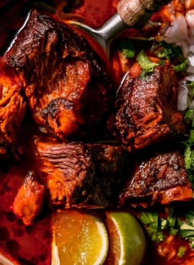 Delicious bowl of authentic Mexican Birria with herbs and spices.