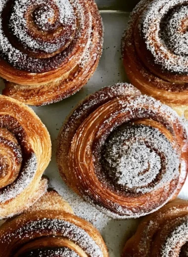Freshly baked Cardamom Sugar Buns with a sprinkle of sugar and spices
