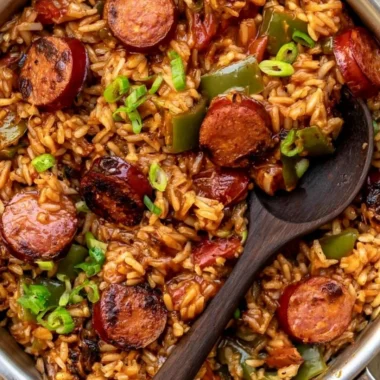 Delicious bowl of cozy Cajun sausage and rice with colorful vegetables