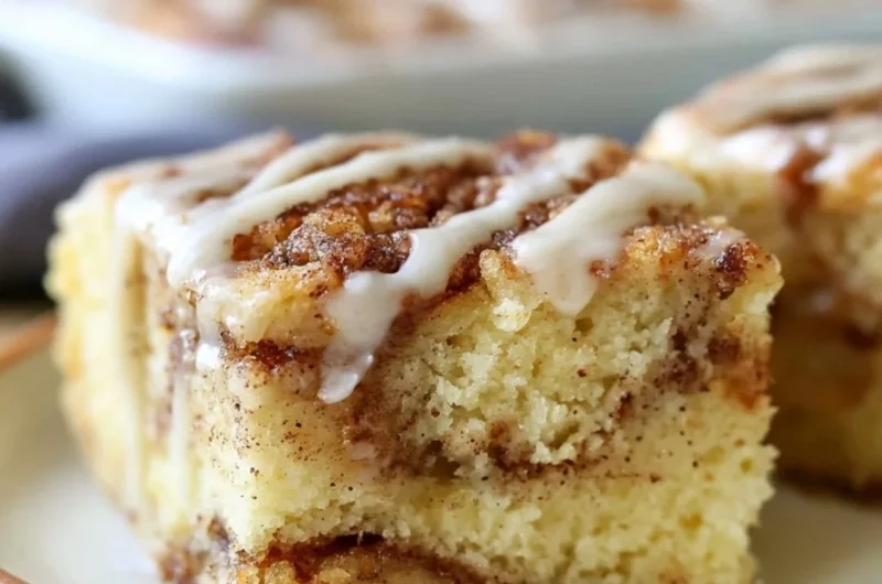 Delicious homemade cozy cinnamon roll cake drizzled with icing