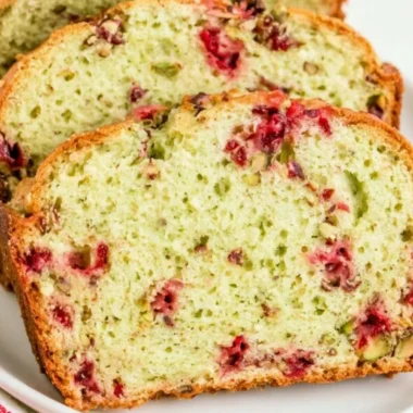 Freshly baked cozy Cranberry Pistachio Bread with nuts and cranberries