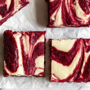 Delicious red velvet cheesecake brownies on a plate