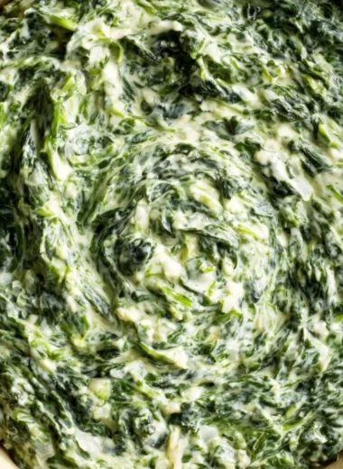Delicious creamy creamed spinach served in a bowl as a comforting side dish.