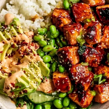 Delicious Honey Sriracha Salmon Bowl garnished with fresh vegetables