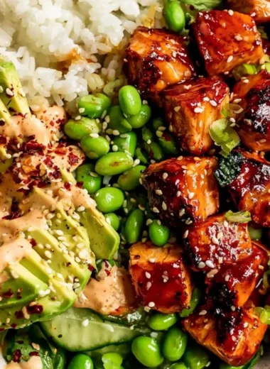 Delicious Honey Sriracha Salmon Bowl garnished with fresh vegetables