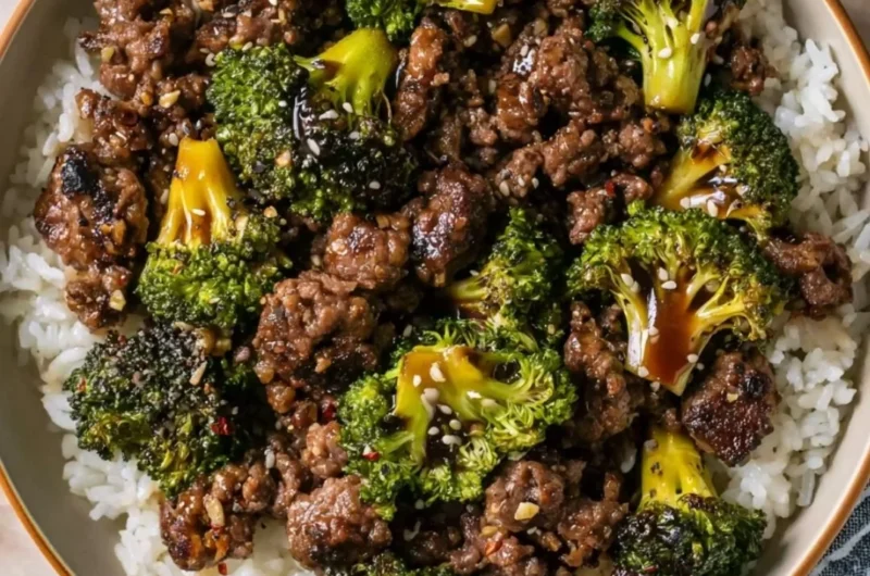 Cozy ground beef and broccoli stir-fry served in a bowl with chopsticks.