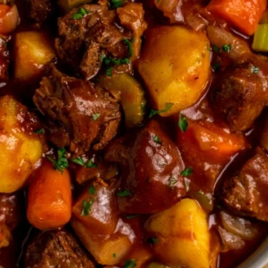 Delicious cozy crock pot beef stew with vegetables and herbs