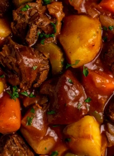 Delicious cozy crock pot beef stew with vegetables and herbs