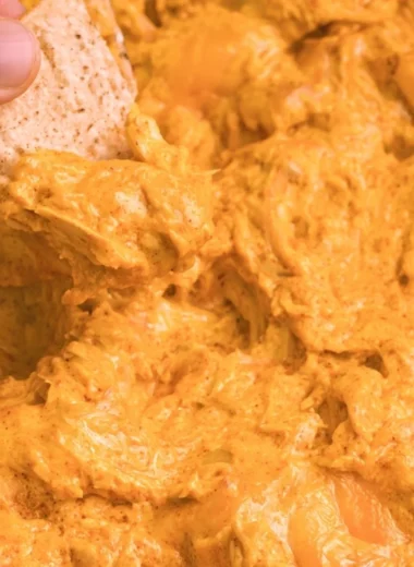 Cozy Crockpot Buffalo Chicken Dip served in a bowl with tortilla chips