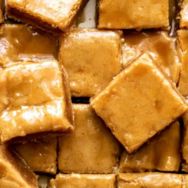 Delicious maple blondies with a glossy maple glaze, perfect for dessert.