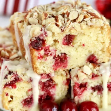 Deliciously moist Cranberry Almond Cake with fresh cranberries and almond slices