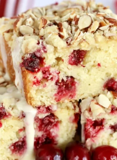 Deliciously moist Cranberry Almond Cake with fresh cranberries and almond slices