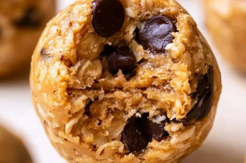 Peanut butter oatmeal protein balls arranged on a plate, a healthy no-bake snack.