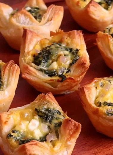 Delicious homemade Spinach Puffs filled with creamy spinach and cheese.