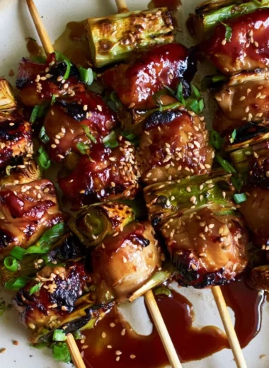 Grilled teriyaki chicken skewers served on a plate